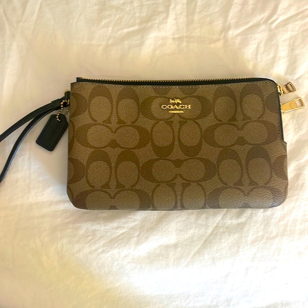 Coach double zip wristlet in signature canvas with black strap